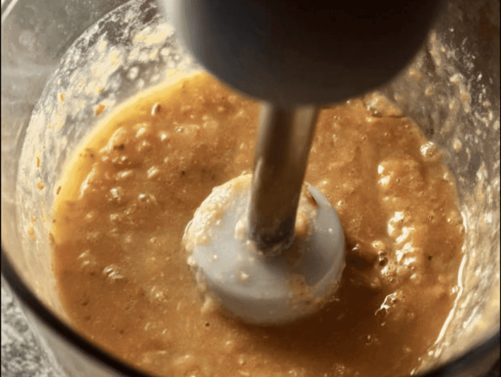 Blending beans to thicken ham and bean soup for creamy texture