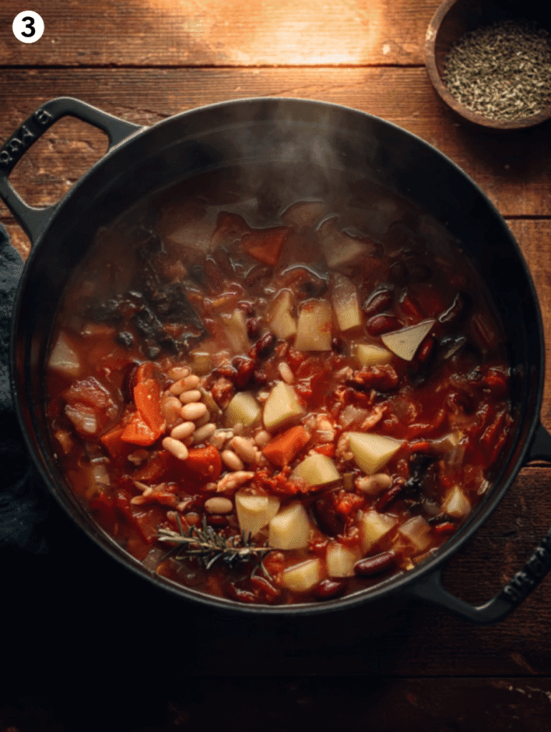 Authentic Italian minestrone soup simmering with beans, tomatoes, and vegetables