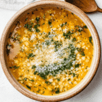 Italian Penicillin Soup Recipe with golden broth, herbs, and Parmesan