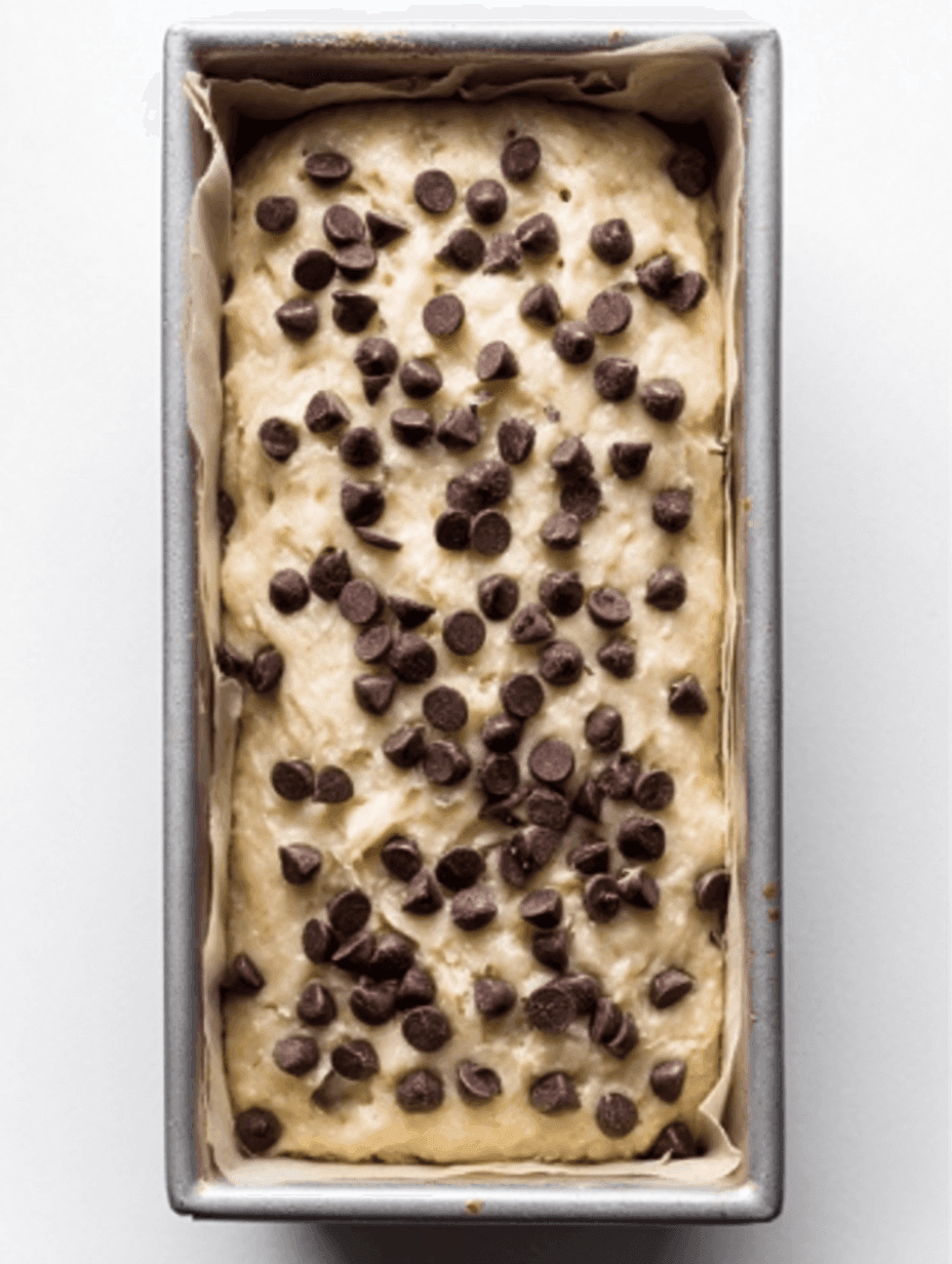 chocolate chip banana bread batter topped with chocolate chips